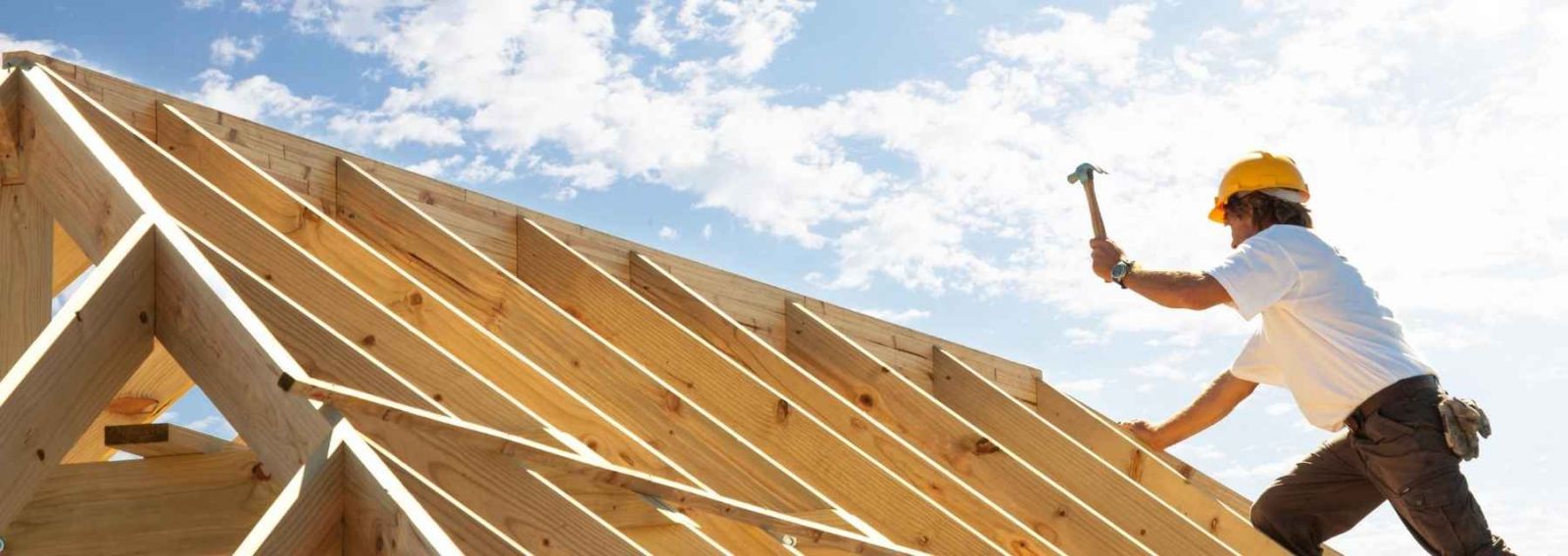 construction worker building a frame